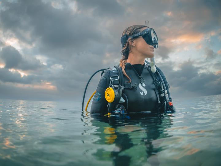 A female diver as she rises from the water