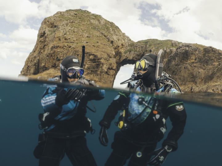 PADI Professionals showing their expertise in the ocean.