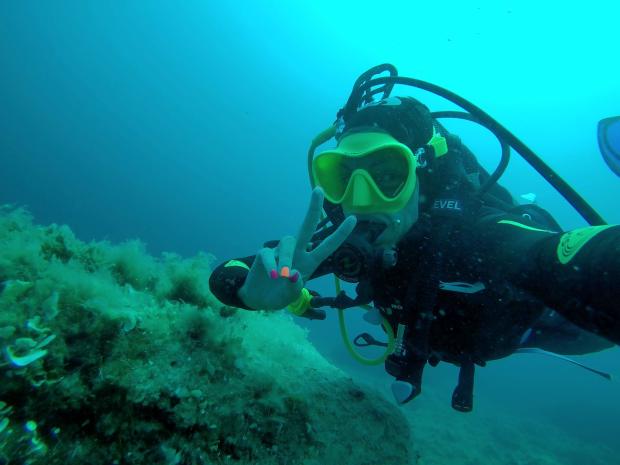Tania Lolla Kaddoura taking a selfie while diving