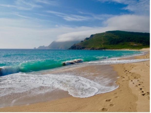 Beach shore with crystal blue waves.