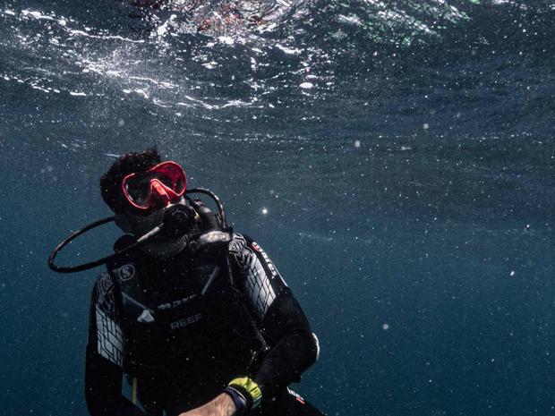 Diver looking up from underwater
