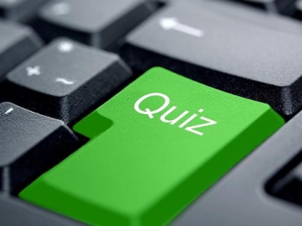 A keyboard button named Quiz