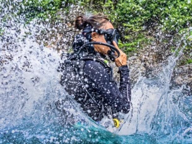 A diver coming up for air.