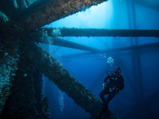 Diver going through a wreck.