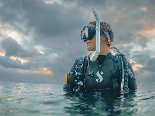 A master scuba diver coming up for air.