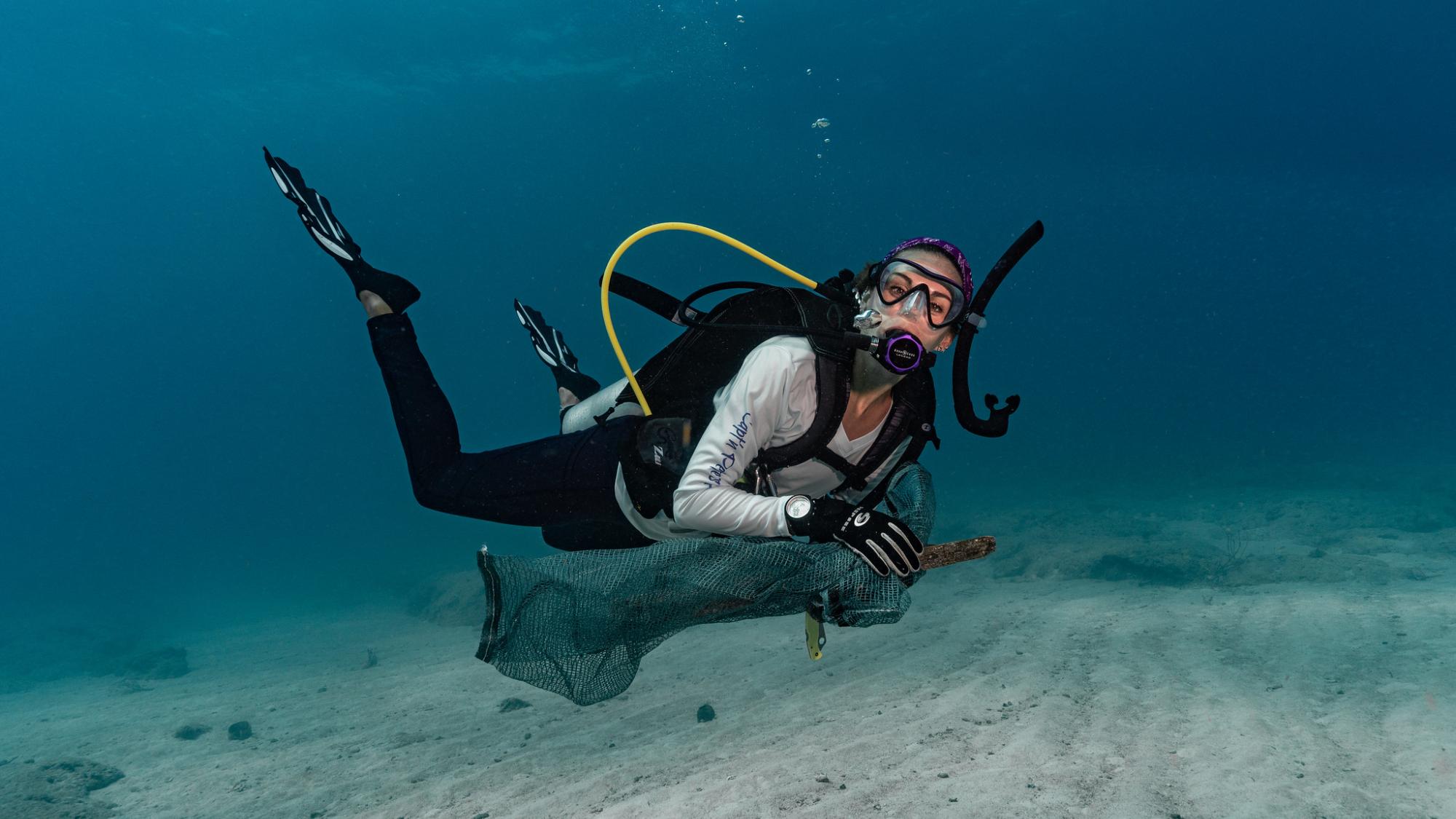 diver taking action underwater