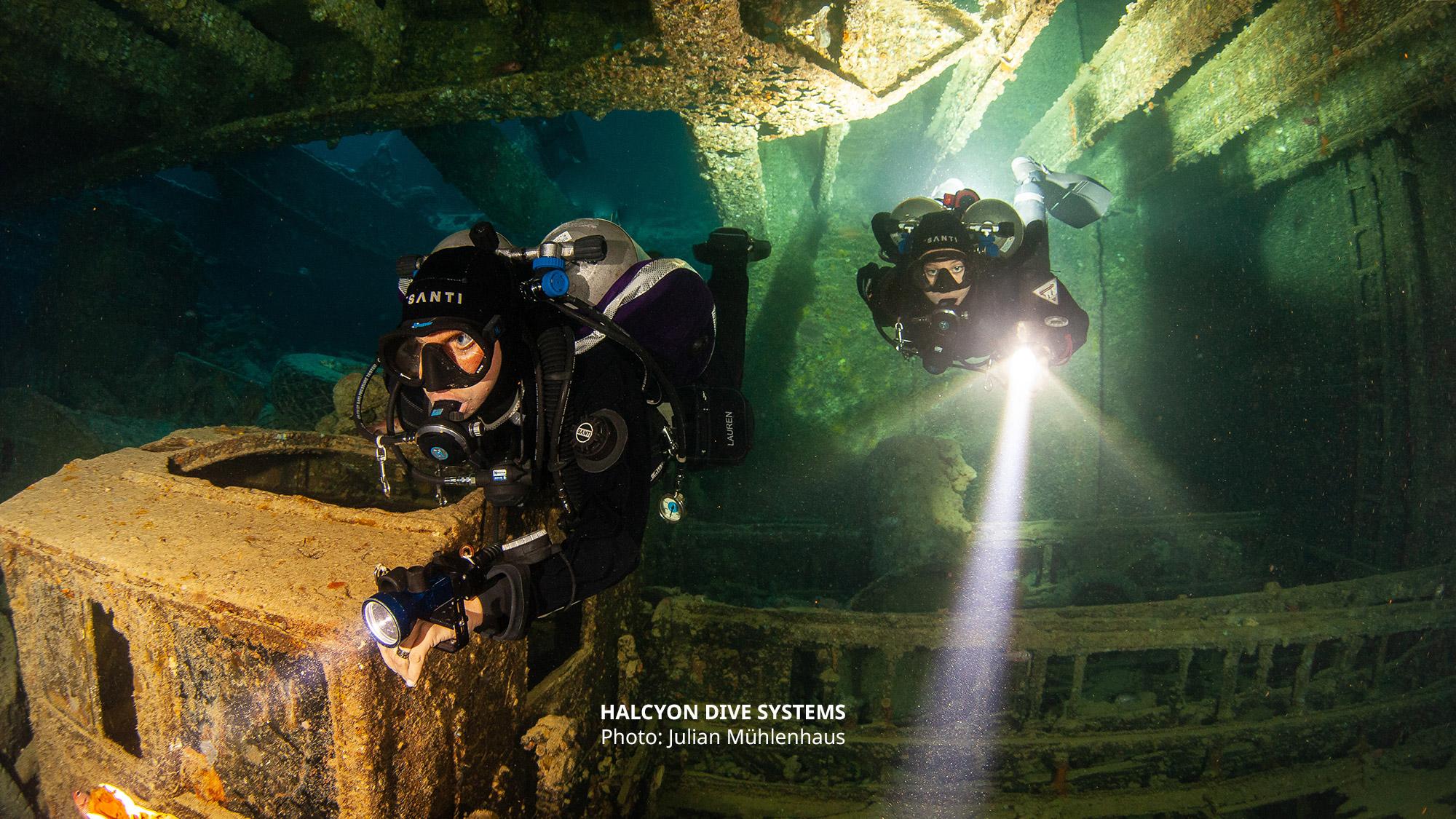 two technical divers inside a wreck