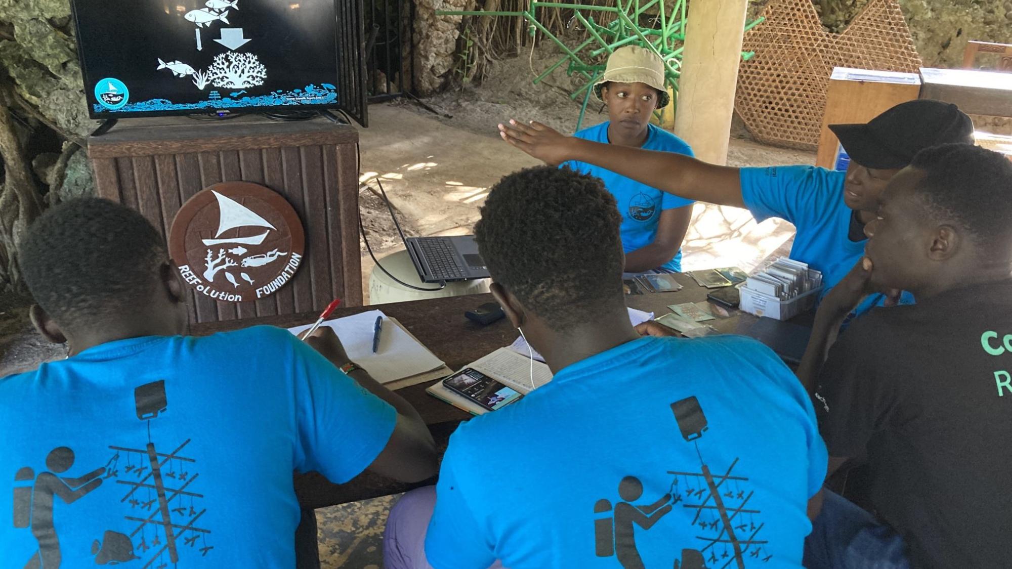 Reef trainees presenting