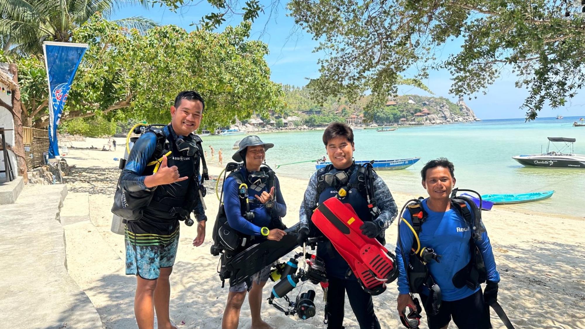 Big Bubble Dive Resort Team on Beach
