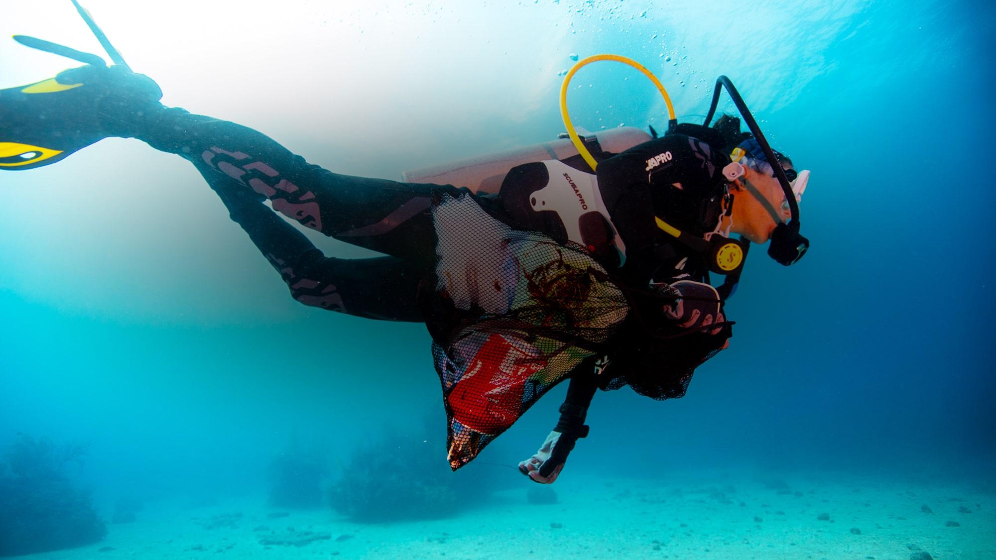 diver swimming in ocean